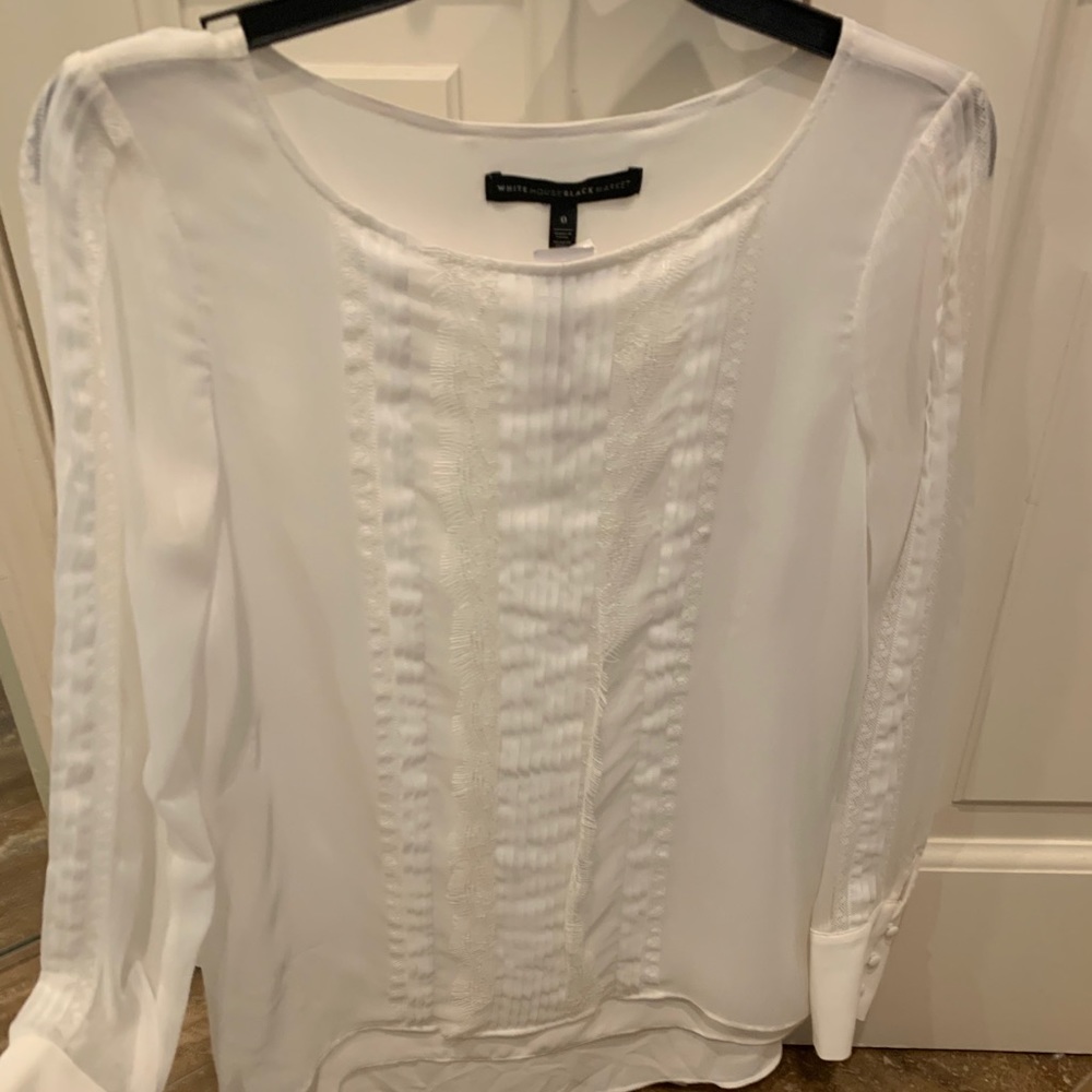 New white long sleeves blouse size 0 fits XS too.